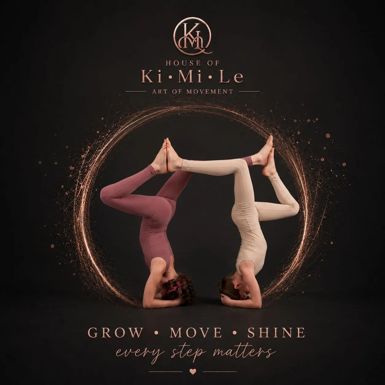 Two dancers supporting each other in a dark studio